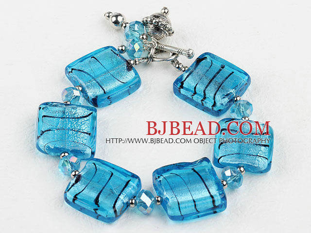 sea blue colored glaze and  crystal bracelet with toggle clasp