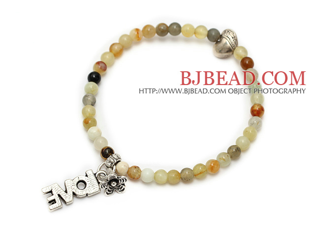 nice round serpentine jade and tibet silver heart flower charm beaded bracelet